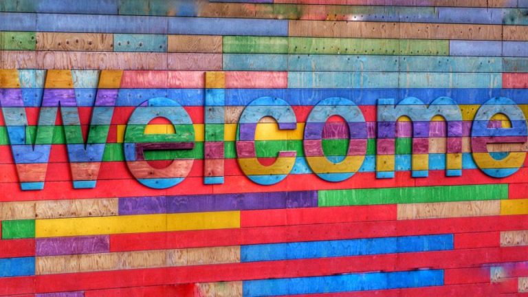 colorful welcome sign wellness