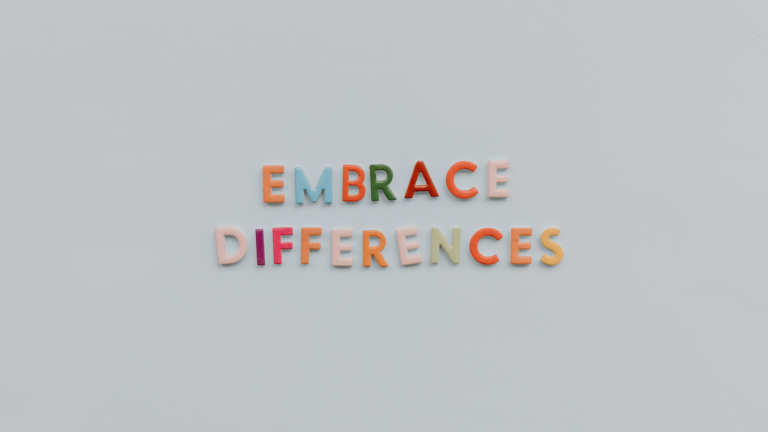 Multi-color letters spell out the words 'embrace differences.'